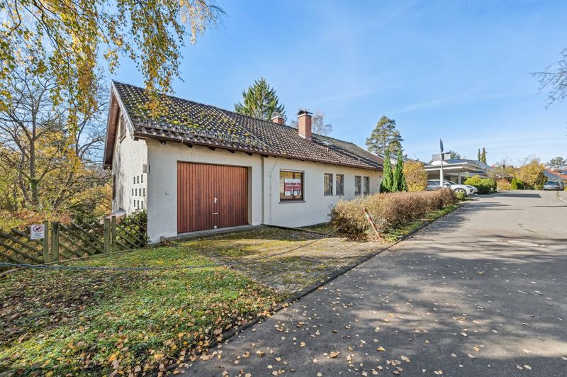 Kapellenberg: Einfamilienhaus mit ELW auf Traumgrundstück in bester Lage
